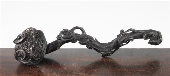 A Chinese lacquered rosewood ruyi sceptre, 41cm